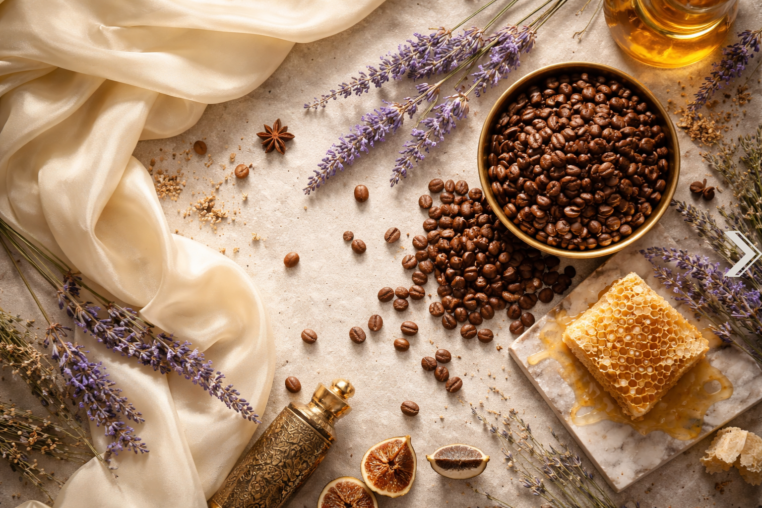 Spices, lavender flowers, and a bowl of coffee beans on a textured surface.